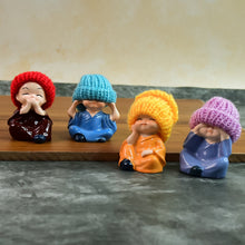 Decorative Resin Monk Buddha Showpiece Set of 4 with Traditional Straw Hats - justgrabit.in | Just Grab It