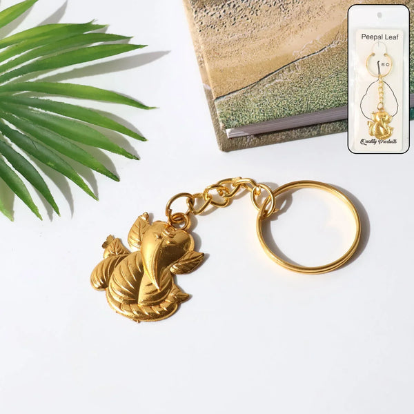 Golden Ganesh Leaf Design Keychain (1 Pc) - justgrabit.in | Just Grab It