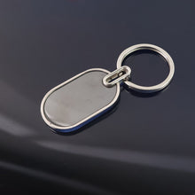 Elegant Black & Silver Oval Metal Keychain (1 Pc) - justgrabit.in | Just Grab It