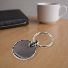 Sleek Black Round Metal Keychain (1 Pc) - justgrabit.in | Just Grab It