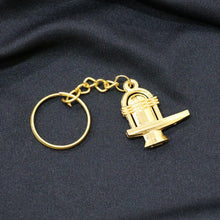 Shivling Golden Metal Keychain (1 Pc) - justgrabit.in | Just Grab It