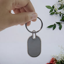 Elegant Black & Silver Oval Metal Keychain (1 Pc) - justgrabit.in | Just Grab It
