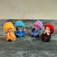 Decorative Resin Monk Buddha Showpiece Set of 4 with Traditional Straw Hats - justgrabit.in | Just Grab It