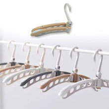 Portable Folding Clothes Hanger (1 Pc): 360° Rotation, Travel, Adjustable - Justgrabit Inc.