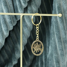 Maa Durga Oval Frame Golden Keychain (1 Pc) - justgrabit.in | Just Grab It