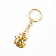 Golden Ganesh Leaf Design Keychain (1 Pc) - justgrabit.in | Just Grab It