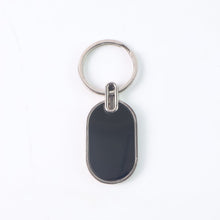 Elegant Black & Silver Oval Metal Keychain (1 Pc) - justgrabit.in | Just Grab It