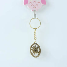 Maa Durga Oval Frame Golden Keychain (1 Pc) - justgrabit.in | Just Grab It
