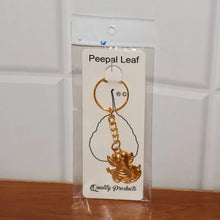 Golden Ganesh Leaf Design Keychain (1 Pc) - justgrabit.in | Just Grab It