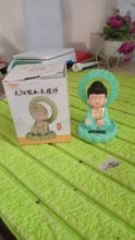 Plastic Solar Powered Moving Head Sitting Action Buddha Statue (1 Pc / Mix Color) - justgrabit.in | Just Grab It