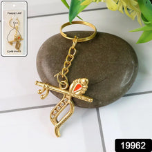 Flute and Peacock Feather Krishna Design Keychain (1 Pc) - justgrabit.in | Just Grab It