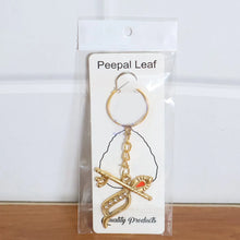 Flute and Peacock Feather Krishna Design Keychain (1 Pc) - justgrabit.in | Just Grab It