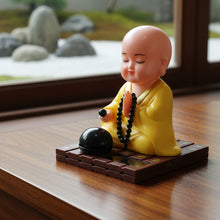 Yellow Solar Powered Sitting Buddha Statue (1 Pc / Medium) - justgrabit.in | Just Grab It