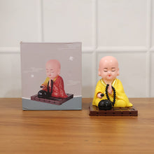 Yellow Solar Powered Sitting Buddha Statue (1 Pc / Medium) - justgrabit.in | Just Grab It