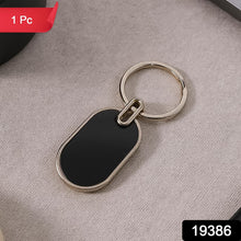Elegant Black & Silver Oval Metal Keychain (1 Pc) - justgrabit.in | Just Grab It