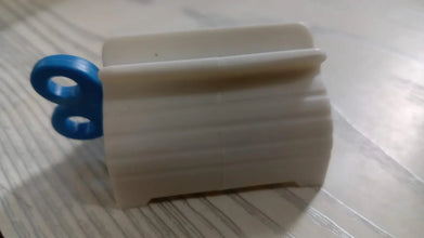 Rolling Tube Toothpaste Squeezer Toothpaste Seat Holder Stand - Justgrabit Inc.