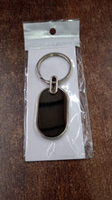 Elegant Black & Silver Oval Metal Keychain (1 Pc) - justgrabit.in | Just Grab It